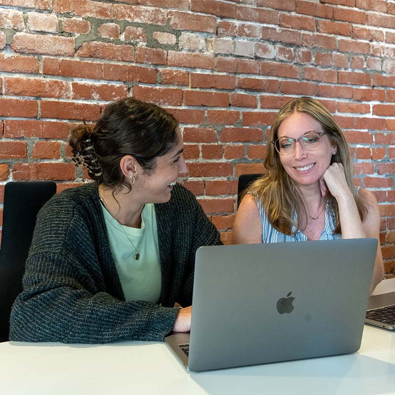 Greenspace staff collaborating at the office